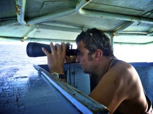 Observer looking for diving birds - copyright Francisco Blaha