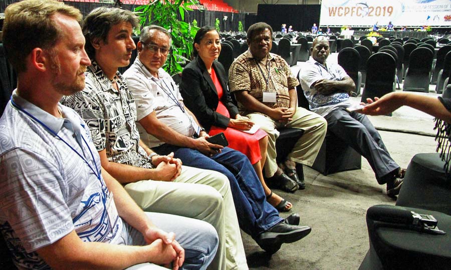 Pew Charitable Trusts' Graham Holmes (second from left in a row of six people sitting together) explains his perspective on one of the missed opportunities at WCPFC16