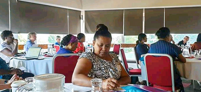 Solomon Islands government representative Rosalie Masu takes notes during the One Ocean Hub workshop. Photo: Dr Transform Aqorau.jpg