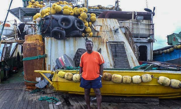Dr Transform Aqorau on deck of a purse-seine fishing vessel. Photo: Giff Johnson.