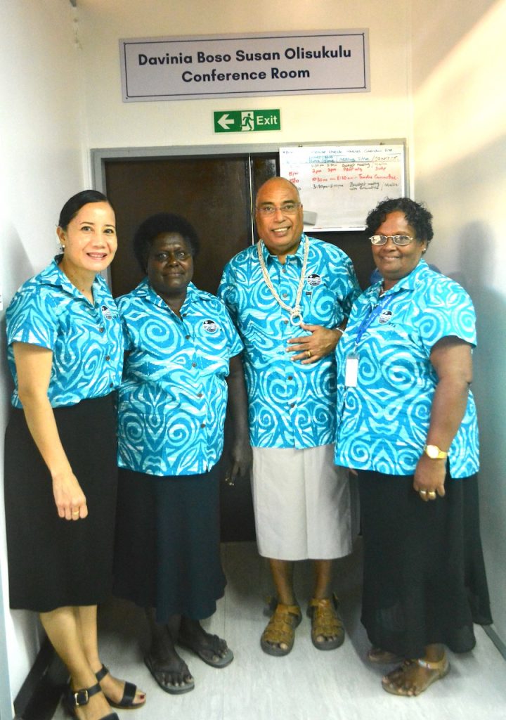 The FFA Director-General, Dr Dr Tupou-Roosen (left) and His Excellency, Collin Beck (second right), with the two longest-serving staff of the FFA, Solomon Islands nationals Mrs Susan Olisukulu (second left) and Davinia Boso (right), in front of the FFA conference room named in their honour earlier this year.
