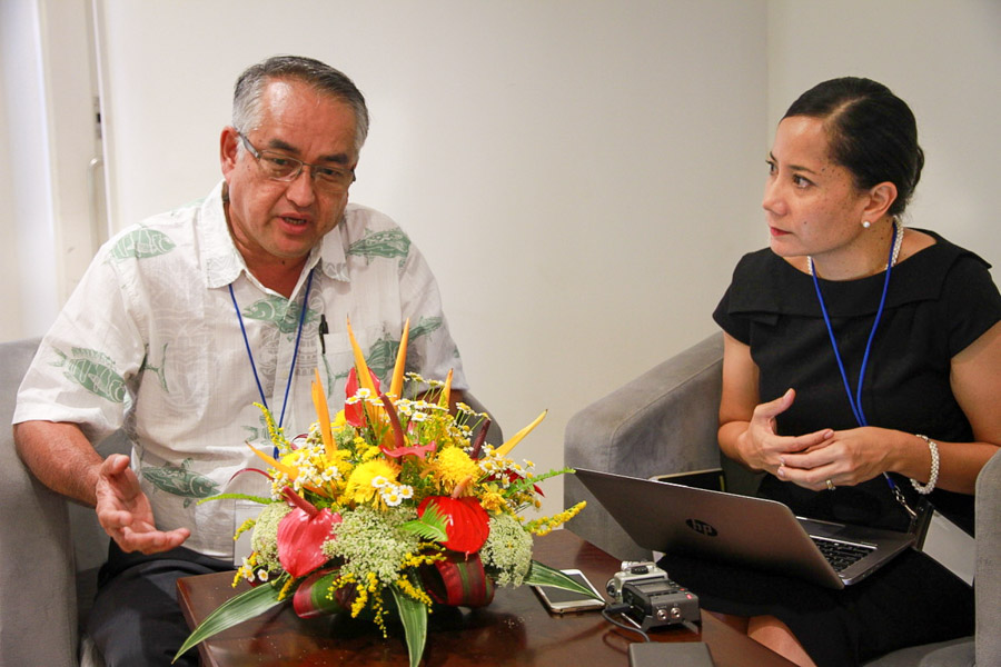 FFC Chair Mr Eugene Pangelinan, left, and FFA Director-General Dr Manu Tupou-Roosen, right, at Sir John Guise Stadium, Port Moresby, for the 16th Tuna Commission meeting.