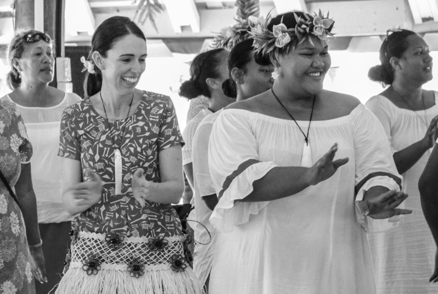 New Zealand Prime Minister Jacinda Ardern (left) learns steps of a traditional dance from Tokelau's Te Kaumana'alofa (right) during official visit to Tokelau in July 2019. Photo: Fatu Tauafiafi/Pacific Guardians.