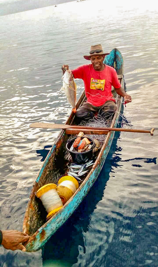 Solomon Islands Ngongosila fisher Walter shows one of his big catches of the day. Photo: Victor Suraniu.