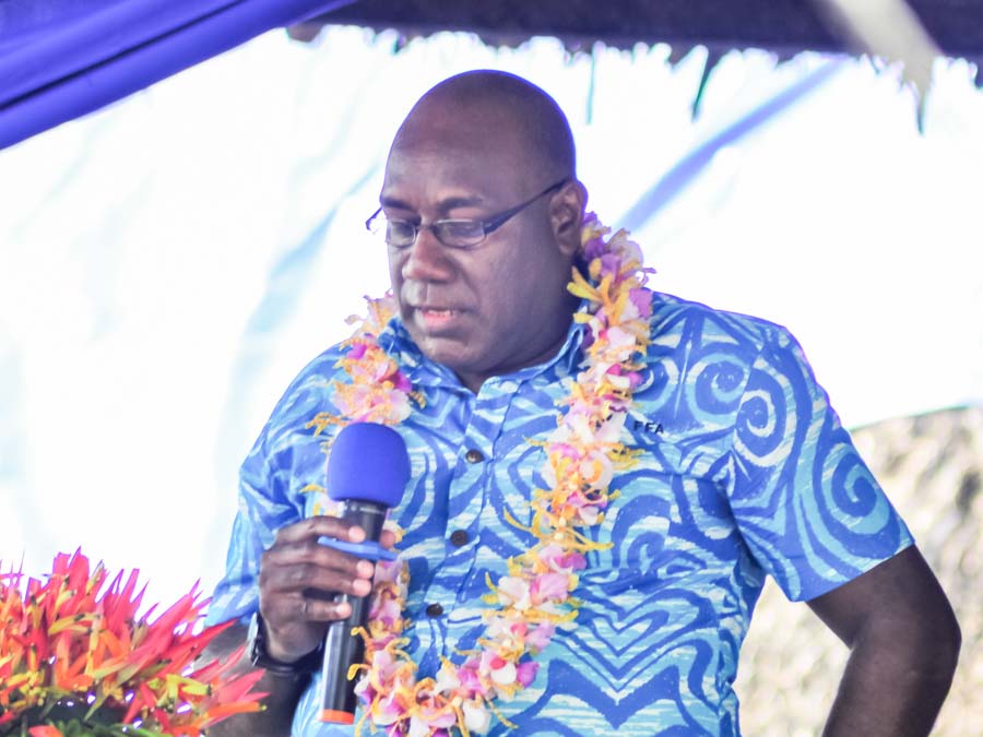 Allan Rahari, of FFA, in Honiara, talks into a microphone. Photo Ronald Toito'ona.