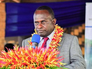 Solomon Islands Minister for the Ministry of Commerce, Industries, Labour, and Immigration, Fredrick Kologeto, talks into a microphone. Photo Ronald Toito'ona.