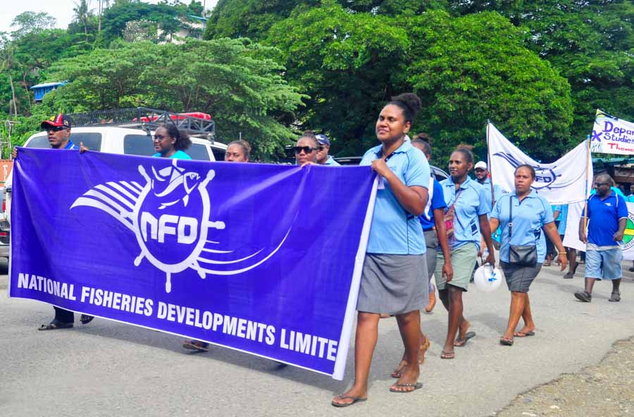 Officers of the National Fisheries Development take part in the parade in Honiara to mark World Tuna Day 2021. Photo: Ronald F. Toito’ona.