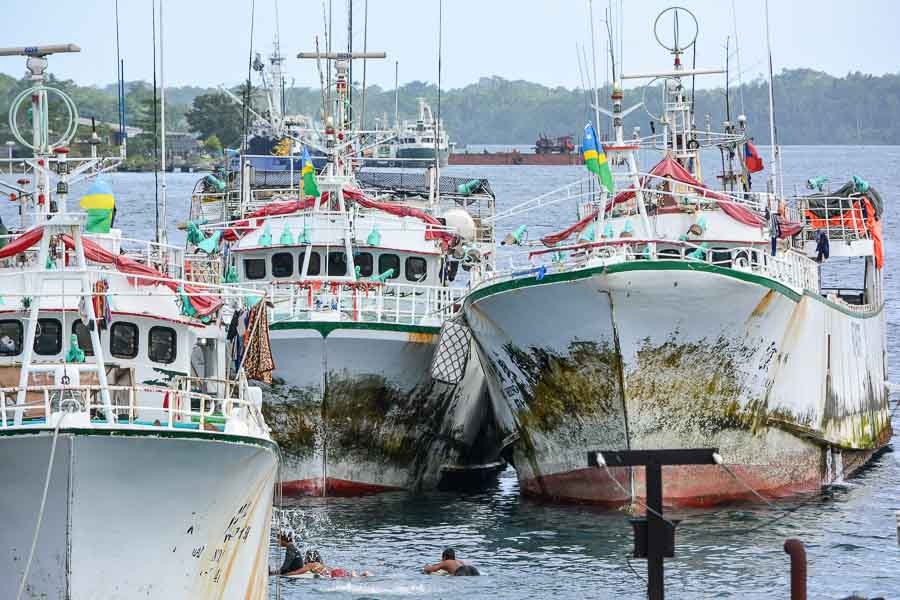Three longline fishing vessels tied up in Noro port, Solomon Islands
